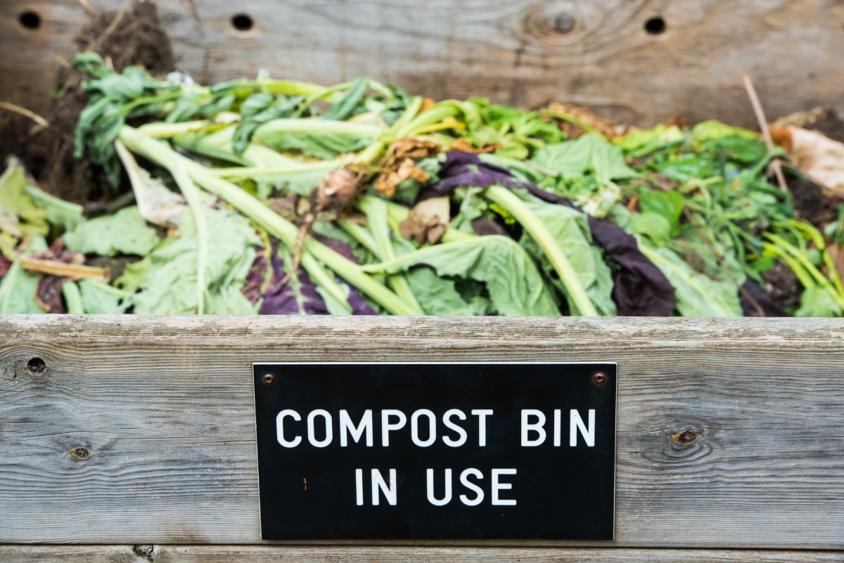Outdoor Compost Bin with sign reading Compost Bin in Use